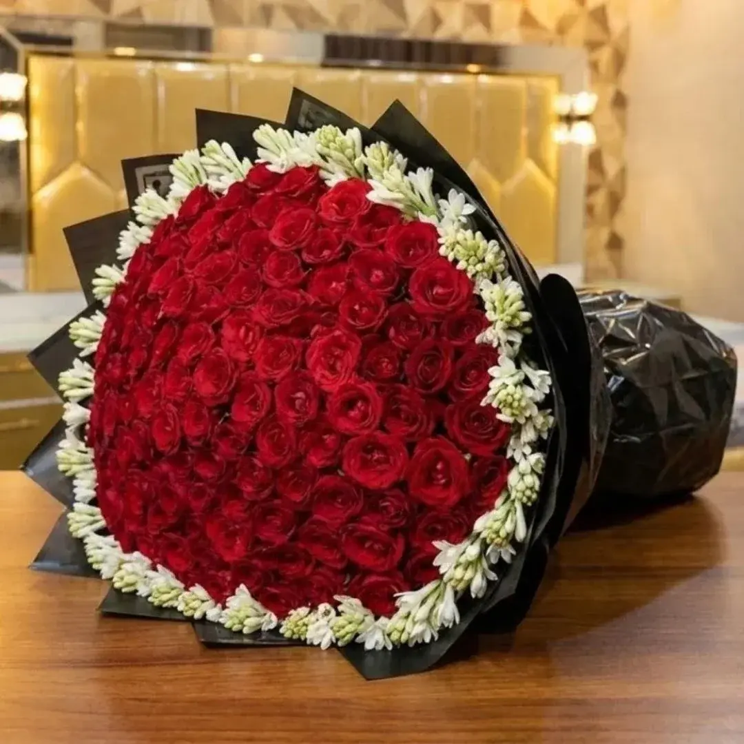 100 Red Roses with premium floral Bouquet